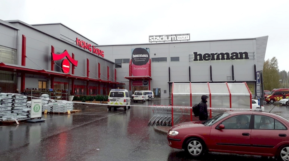 Police cars stand on the blocked grounds of the Hermanni shopping center in Kuopio, Finland, after an attack occurred on the premises of the Savo Vocational College on Tuesday. — AFP