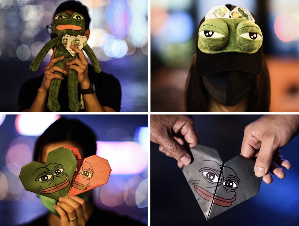 This combination image of four pictures taken on Sept. 30, 2019 shows protesters holding up various items, clockwise, from top left, such as a stuffed toy, headband, and origami hearts depicting Pepe the Frog, a character used by pro-democracy activists as a symbol of their struggle, by the waterfront along Victoria Harbour in Hong Kong's Tim Sha Tsui district. — AFP