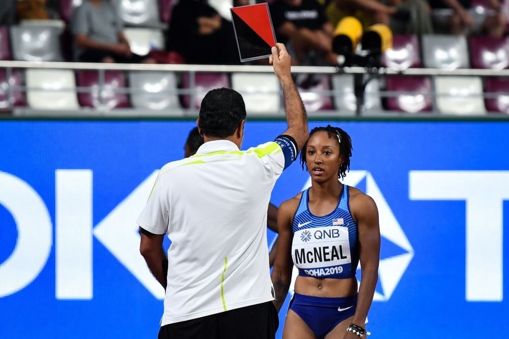 USA's Brianna McNeal is disqualified during the Women's 100m Hurdles heats at the 2019 IAAF Athletics World Championships at the Khalifa International stadium in Doha, on Saturday. — AFP