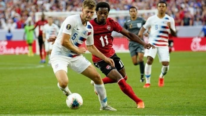 United States defender Walker Zimmerman, left, was removed from the United States training camp Monday for upcoming matches against Cuba and Canada. — AFP