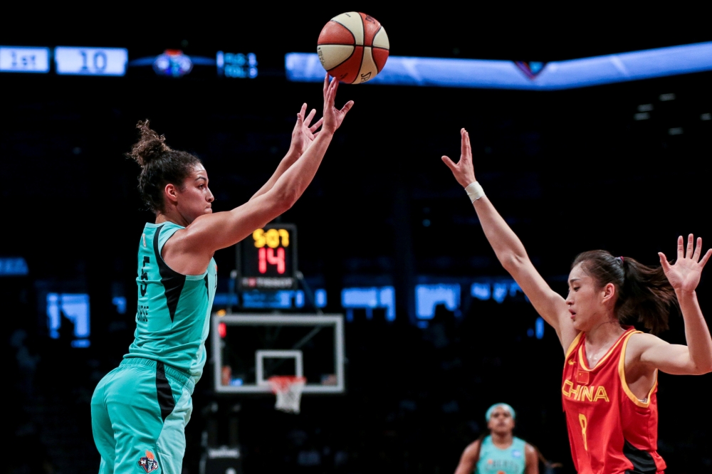 In this file photo taken on May 9, 2019, New York Liberty guard Kia Nurse (5) shoots the ball over China National Team forward Wang Xuemeng (8) during the first quarter of the preseason WNBA game at Barclays Center, New York City, NY. — Reuters