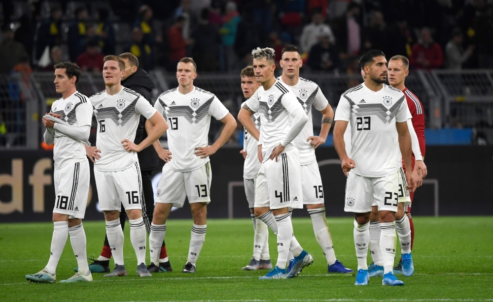 Germany's players leave the field after a friendly football match between Germany v Argentina at the Signal-Iduna Park in Dortmund, Germany, on Wednesday. — AFP