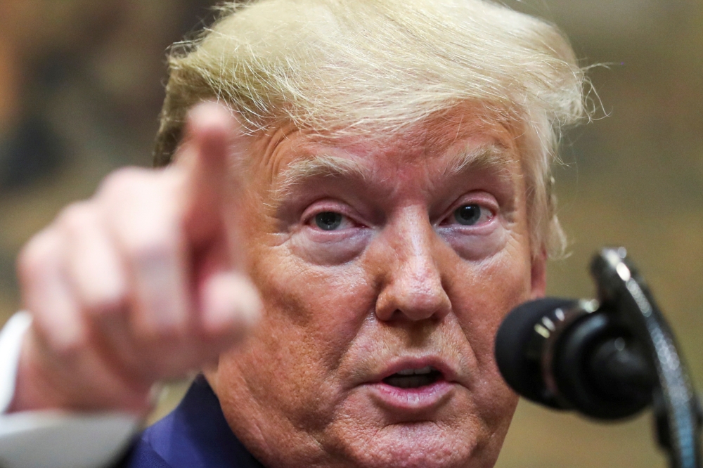 US President Donald Trump speaks during an event to sign executive orders on 