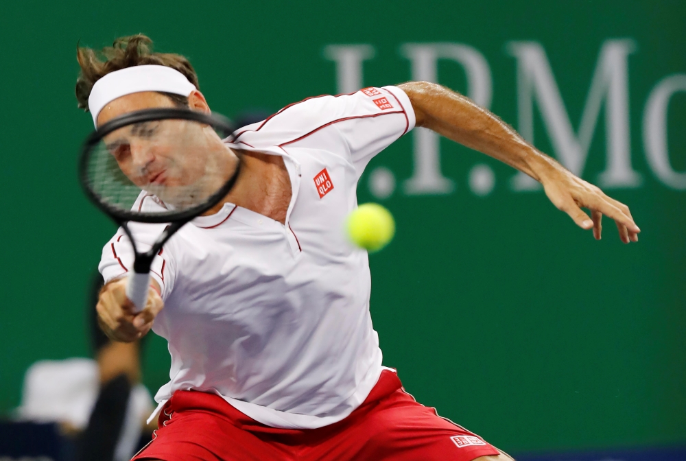 Roger Federer of Switzerland in action against David Goffin of Belgium in the Men's singles of the Shanghai Masters in Shanghai, China, on Thursday. — Reuters