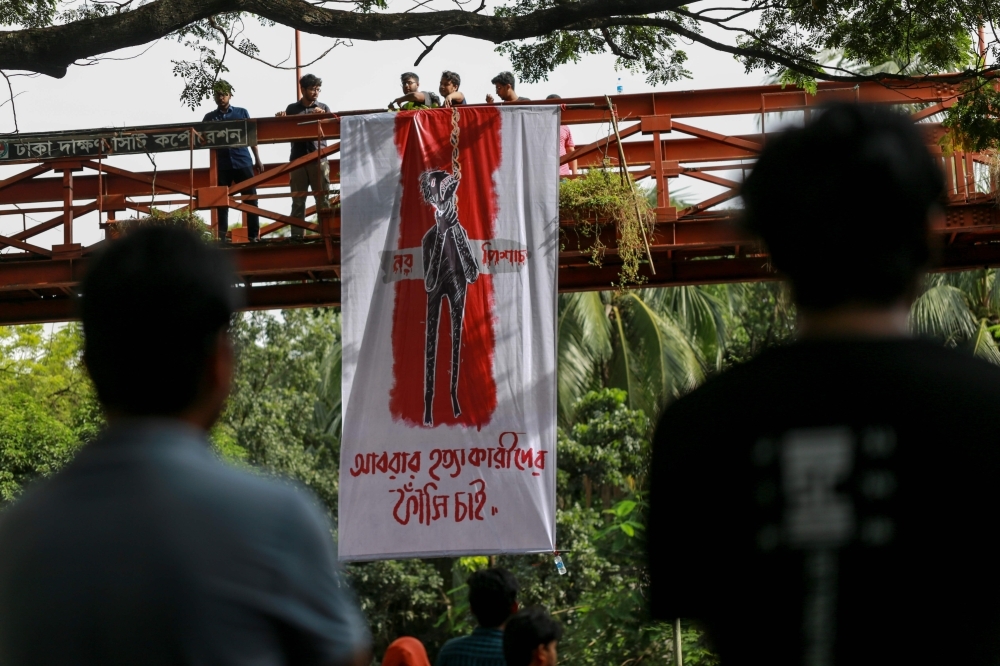 Students of Bangladesh University of Engineering and Technology (BUET) block a road and take part in a protest in Dhaka on Thursday, after a pupil was allegedly beaten to death by ruling party activists. — AFP