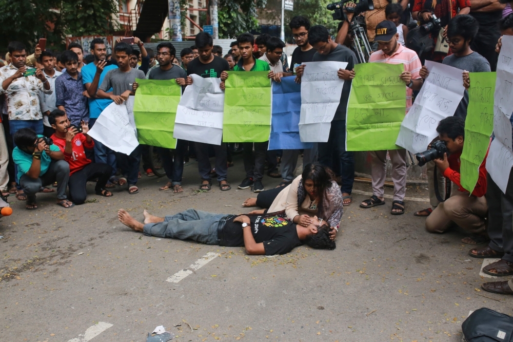 Students of Bangladesh University of Engineering and Technology (BUET) block a road and take part in a protest in Dhaka on Thursday, after a pupil was allegedly beaten to death by ruling party activists. — AFP