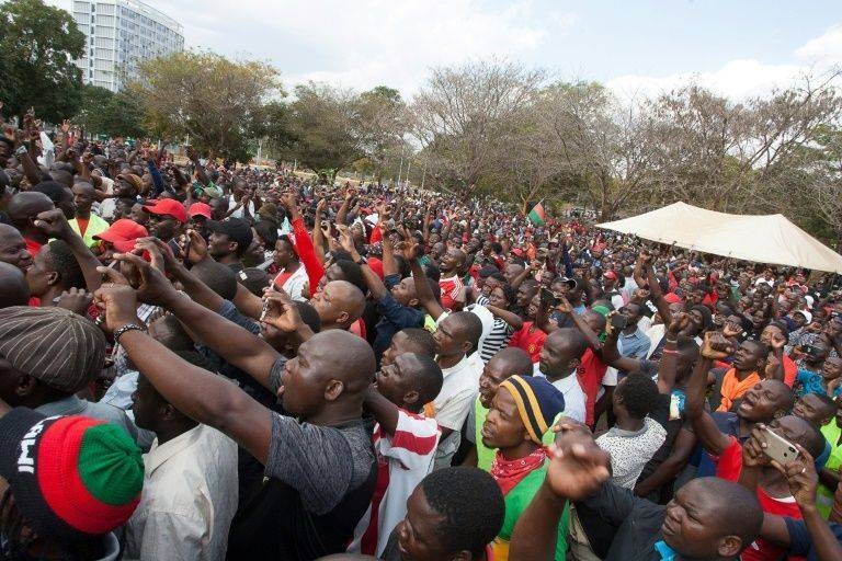 Malawi opposition supporters march to the parliament during a demonstration against the re-election of the president, which protestors say was due to fraud, on July 4, 2019, in Lilongwe, Malawi -AFP