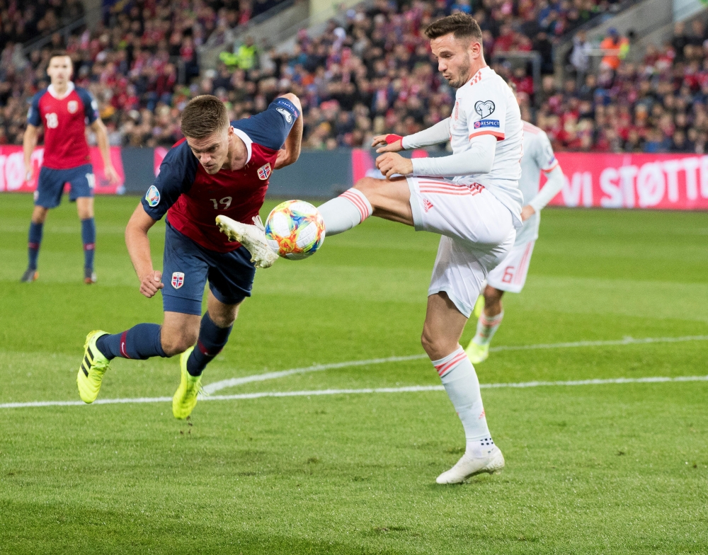 Spain's Saul Niguez fights for the ball against Norway's Markus Henriksen during Euro 2020 Qualifier Group F at Ullevaal Stadium, Oslo, Norway, on Saturday. — Reuters