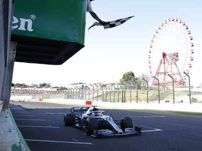 Mercedes driver Valtteri Bottas gets the checkered flag while crossing the finish line to win the Japanese Grand Prix. — Courtesy photo