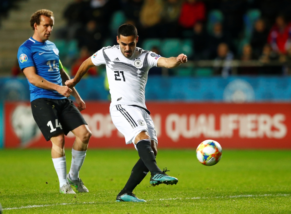 Germany's Marcel Halstenberg in action with Estonia's Nikita Baranov during Euro 2020 Qualifier Group C in  Tallinn, Estonia, on Sunday. — Reuters

