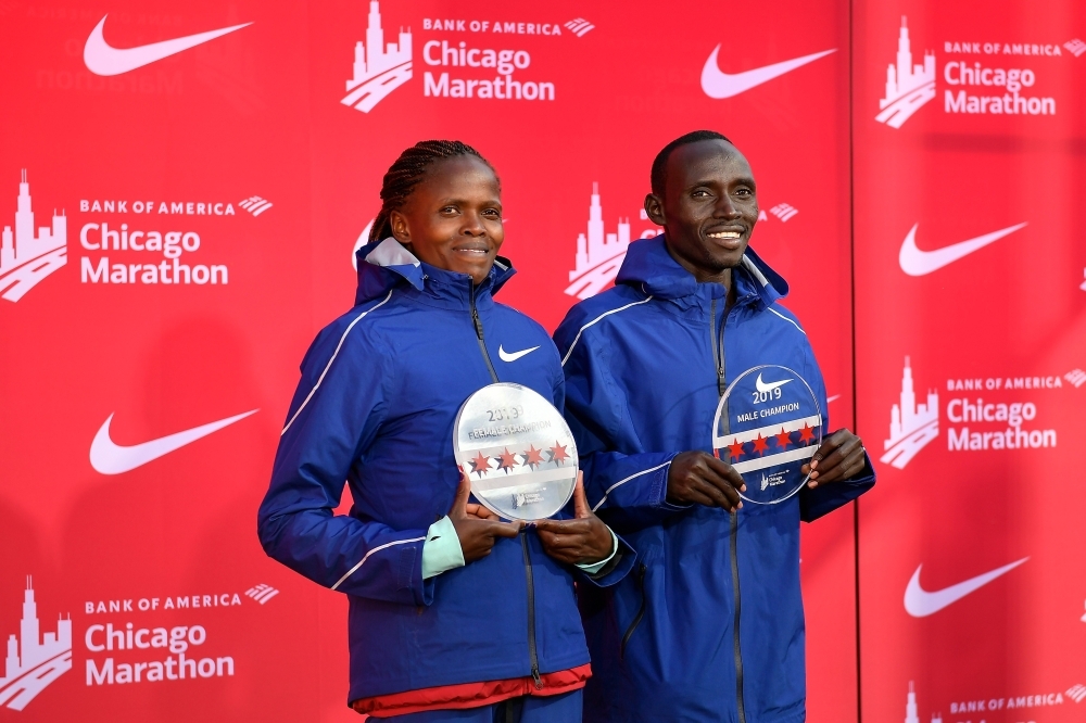 Brigid Kosgei of Kenya poses for a photo after breaking the world record to win the 2019 Bank of America Chicago Marathon in Chicago, Illinois, on Sunday. — AFP