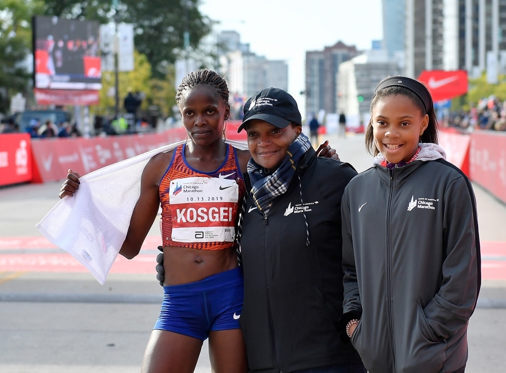 Brigid Kosgei of Kenya poses for a photo after breaking the world record to win the 2019 Bank of America Chicago Marathon in Chicago, Illinois, on Sunday. — AFP