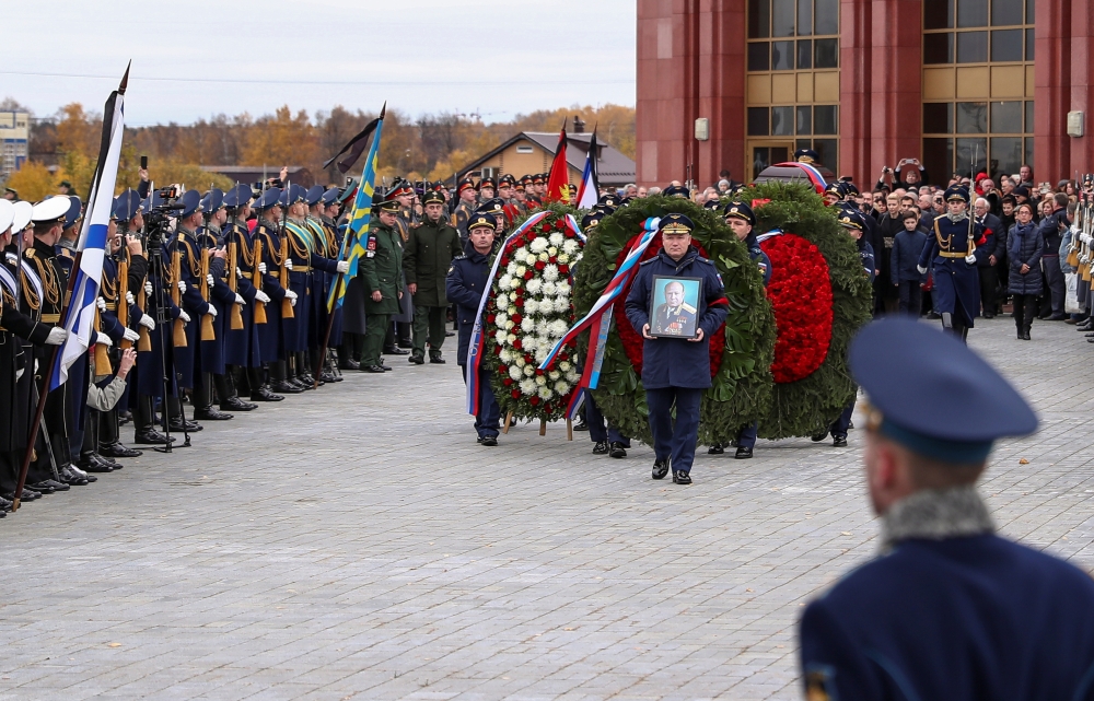 Officers carry a coffin of Alexei Leonov, the first man to conduct a space walk in 1965, during his funeral in Mytishchi, outside Moscow, Russia, on Tuesday. — Reuters