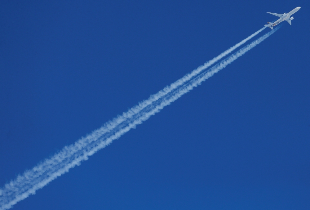 An Etihad Airways Airbus plane flies over St. Moritz, Switzerland, in this Feb. 13, 2017 file photo. — Reuters