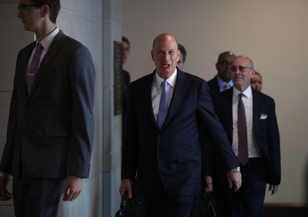 US Ambassador to the European Union Gordon Sondland arrives at a closed session before the House Intelligence, Foreign Affairs and Oversight committees Thursday at the US Capitol in Washington, DC. Sondland testified on Capitol Hill to testify to the committees for the ongoing impeachment inquiry against President Donald Trump. — AFP