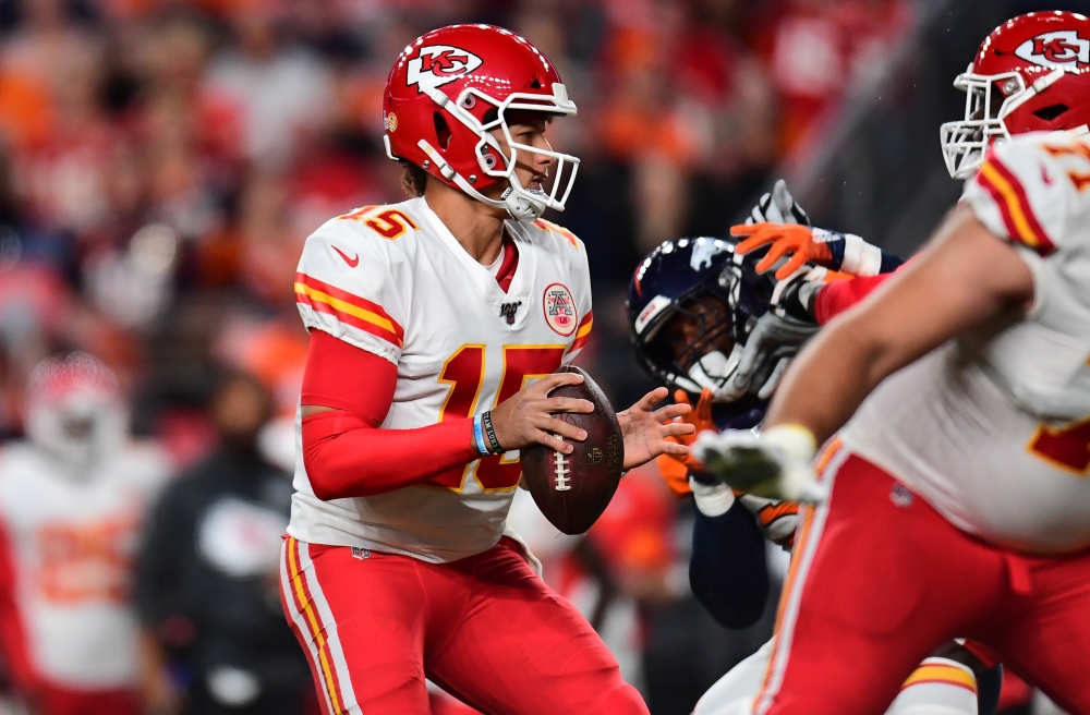 Kansas City Chiefs quarterback Patrick Mahomes (15) drops pack to pass the ball in the first quarter against the Denver Broncos at Empower Field at Mile High. — Reuters