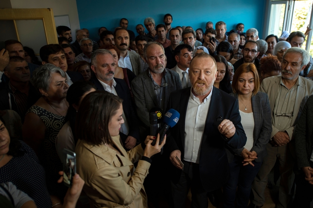 Co-leader of pro-Kurdish Peoples' Democratic Party (HDP) Sezai Temelli, center, gives a press conference on Turkish military operation in Syria, in Istanbul, in this Oct. 13, 2019 file photo. — AFP