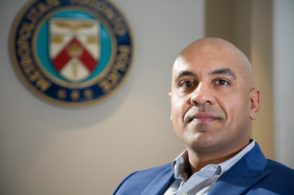 Toronto Police Constable Ron Chhinzer poses for a photo after an interview at the Toronto Police Service 23 Division, in Toronto on Oct. 15, 2019. Long associated with gang violence, the Regent Park neighborhood of Toronto — Canada's largest city — has changed. But firearms continue to claim casualties, prompting calls ahead of national elections on Oct. 21 for tougher gun controls. Ron Chhinzer, a detective in the Toronto Police Gang Prevention Unit, is concerned about the age of those involved in the violence. — AFP