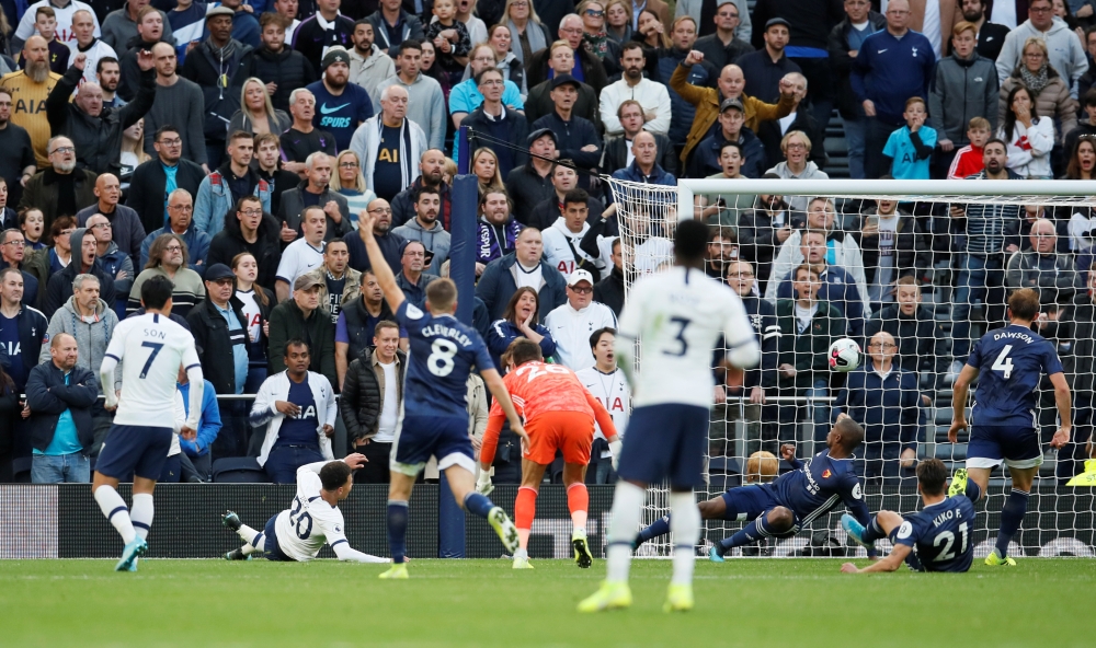 Tottenham Hotspur's Dele Alli scores its first goal against Watford at Tottenham Hotspur Stadium, London, on Saturday. — Reuters
