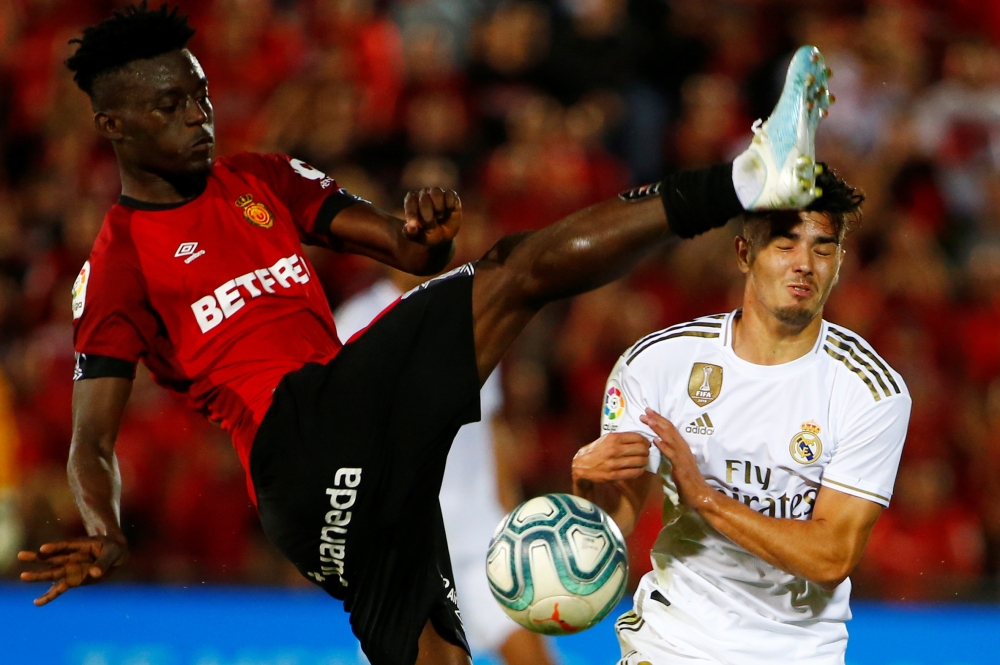 Mallorca's Iddrisu Baba in action with Real Madrid's Brahim Diaz at Iberostar Stadium, Palma, Spain, on Saturday. — Reuters