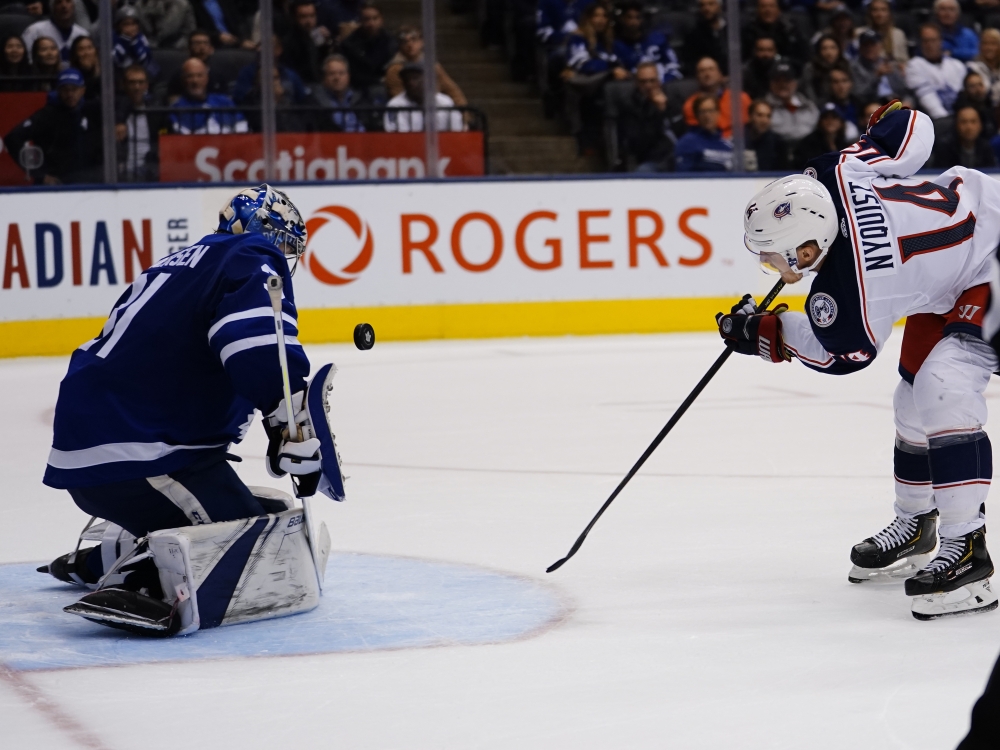 Toronto Maple Leafs goaltender Frederik Andersen (31) makes a save on Columbus Blue Jackets forward Gustav Nyquist (14) at Scotiabank Arena in Toronto, Ontario, Canada, on Monday. Columbus defeated Toronto in overtime. — Reuters