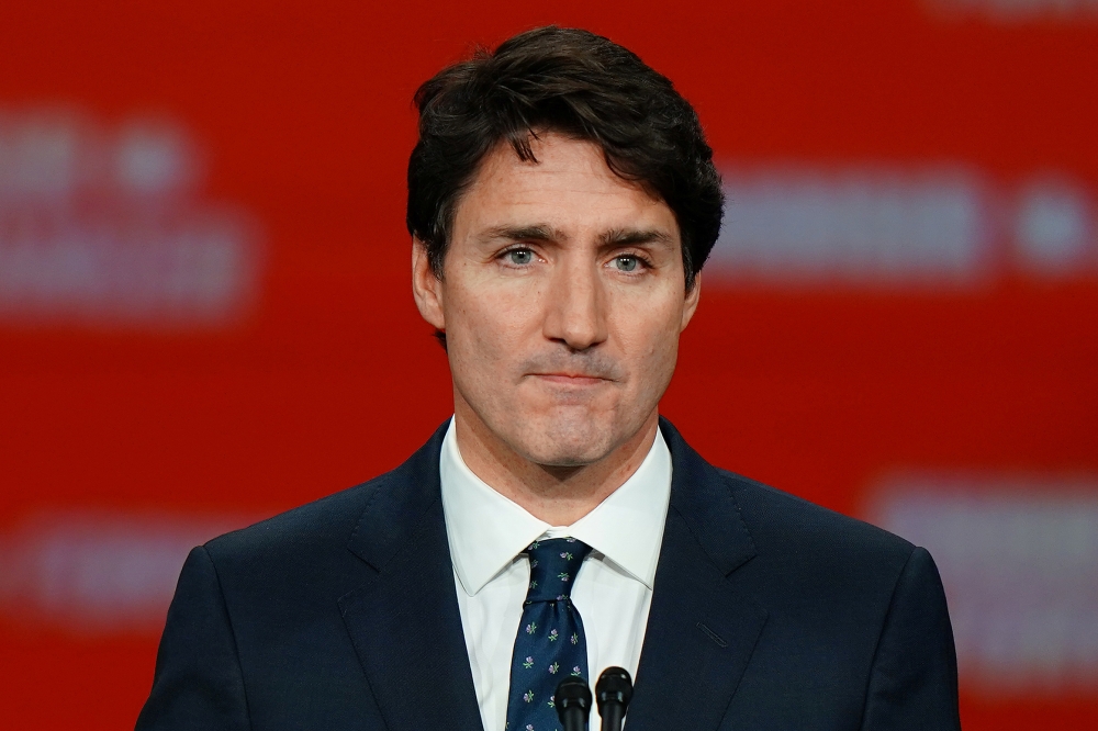 Liberal leader and Canadian Prime Minister Justin Trudeau stands on stage after the federal election at the Palais des Congres in Montreal, Quebec, Canada, on Tuesday. — Reuters