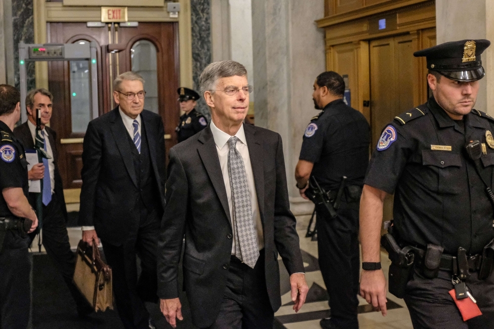 Bill Taylor, the top US diplomat to Ukraine, leaves Capitol Hill in Washington on Tuesday. — AFP