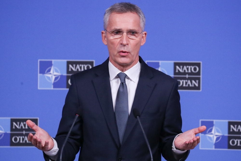 NATO Secretary General Jens Stoltenberg talks to journalists during a press conference prior to NATO defense ministers meeting in Brussels on Wednesday. — AFP