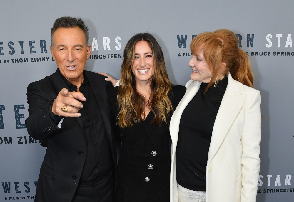 US singer-songwriter Bruce Springsteen, left, his daughter Jessica Springsteen, center, and his wife Patti Scialfa attend the New York special screening of 