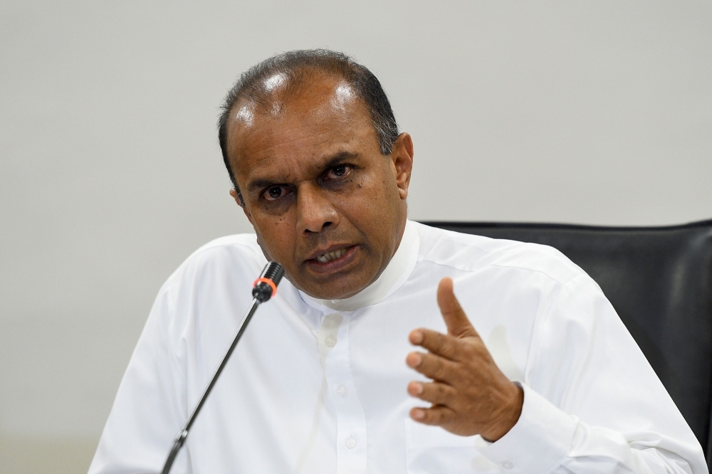 Sri Lanka Deputy Speaker and Special Parliamentary Select Committee Chairman Ananda Kumarasiri speaks during a press conference in Colombo on Wednesday. — AFP
