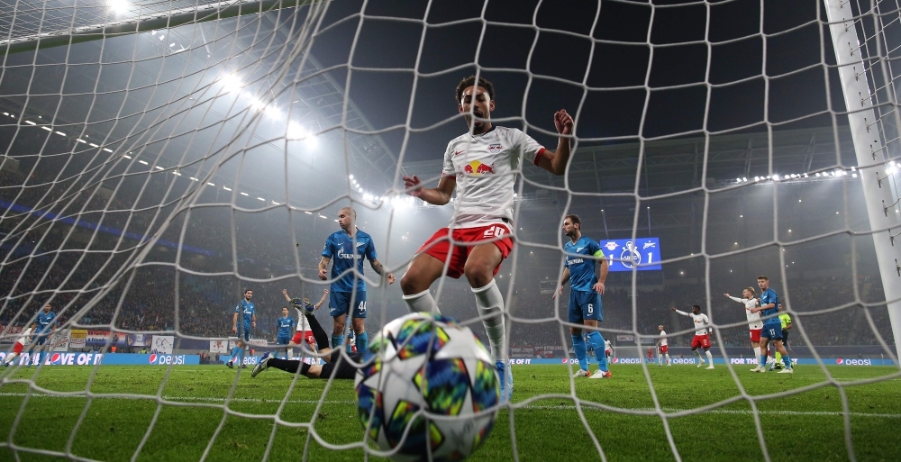 Leipzig's Brazilian forward Matheus Cunha (C) celebrates his team's 2-1 goal during the UEFA Champions League Group G football match RB Leipzig vs Zenit St Petersburg in Leipzig, eastern Germany, on Wednesday. — AFP