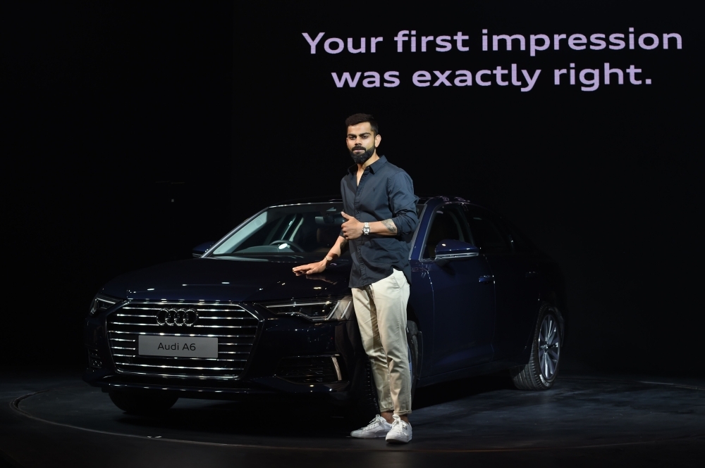 India's cricket team captain Virat Kohli poses during a promotional event for the India launch of the Audi A6 car in Mumbai on Thursday. — AFP
