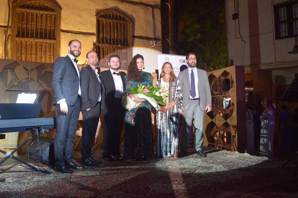 A group picture for the consul general of Italy Stefano Stucci alongside the opera singers in the center of historic Jeddah at Barahat Nassif. Photos by Abdulrahman Rammal.