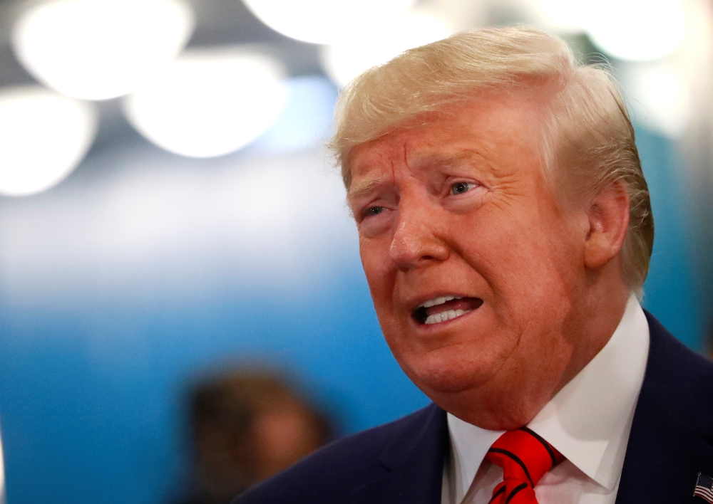 US President Donald Trump speaks to reporters as he arrives for the 74th session of the United Nations General Assembly at UN headquarters in New York City, New York, US, Sept. 24, 2019. — Reuters