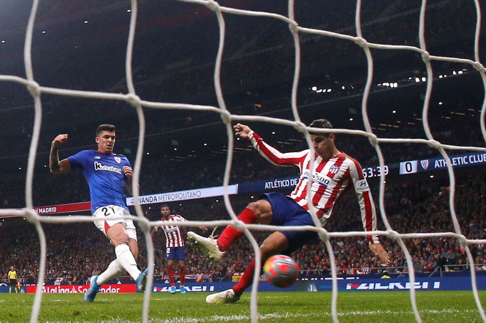Atletico Madrid's Alvaro Morata scores their second goal against Athletic Bilbao at Wanda Metropolitano, Madrid, Spain, on Saturday. — Reuters