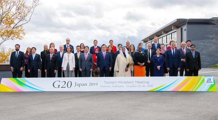 Ahmad Al Khateeb, SCTH chairman, poses with others for a group picture at the G20 Tourism Ministers meeting here in Japan on Sunday. 