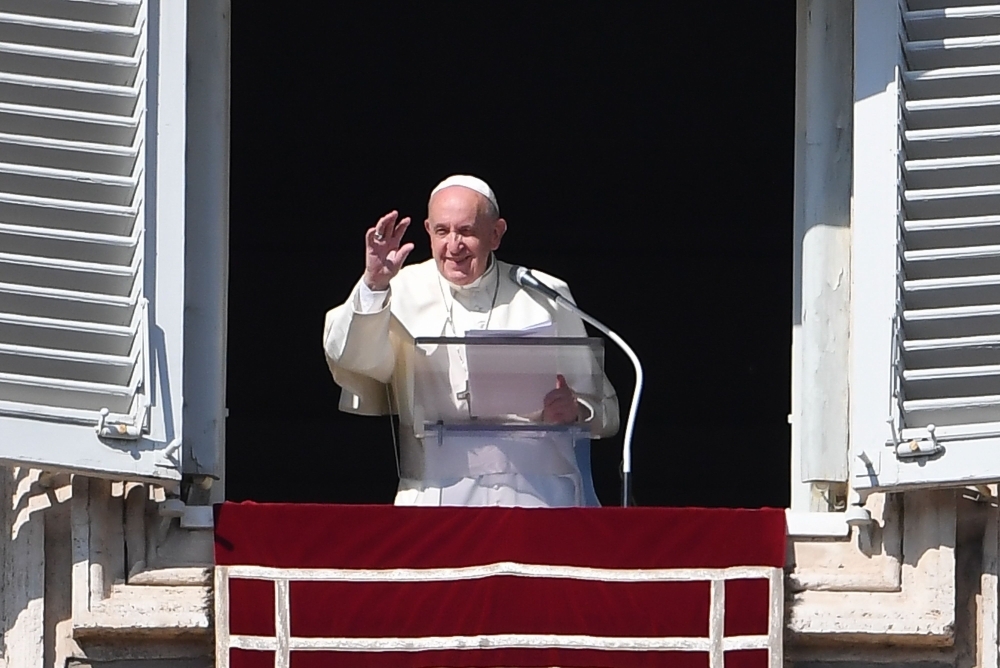 Pope Francis addresses the Sunday Angelus prayer from the window of the apostolic palace overlooking Saint Peter's Square in The Vatican on Sunday. — AFP