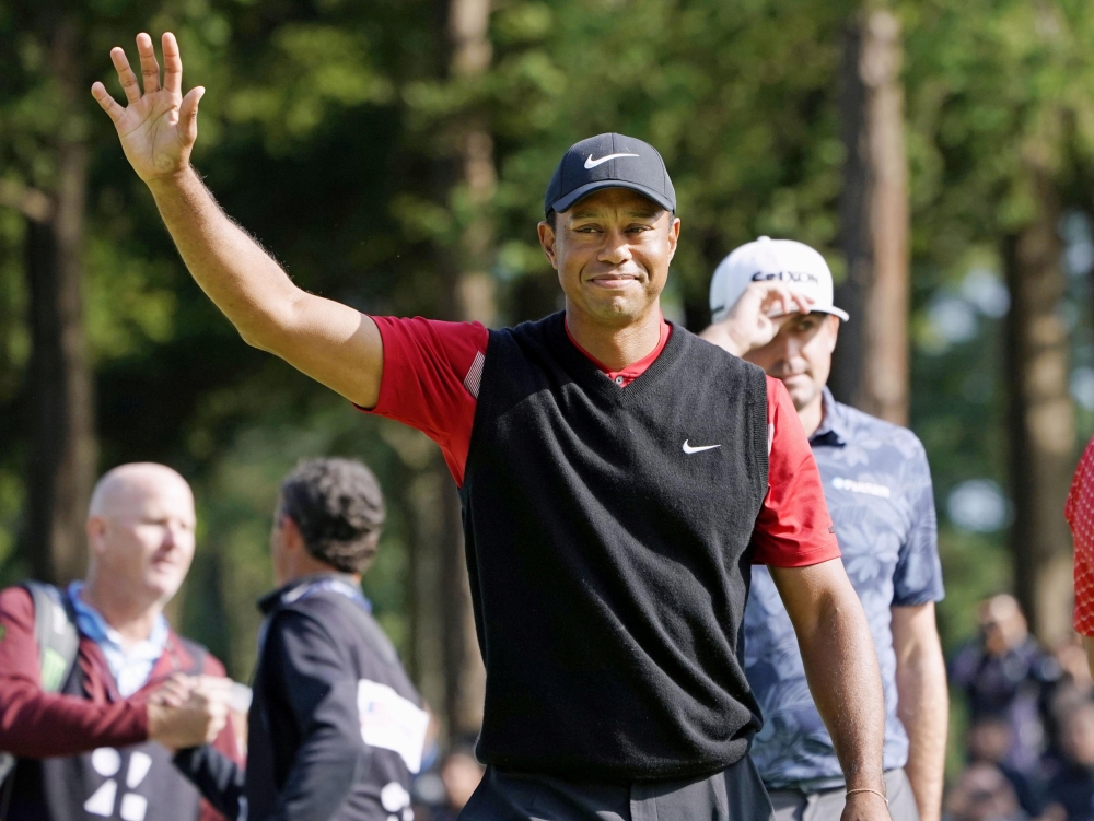 Tiger Woods celebrates to win the final round of the Zozo Championship, a PGA Tour event, at Narashino Country Club in Inzai, Chiba Prefecture, east of Tokyo, Japan, on Monday, in this photo released by Kyodo. — Reuters