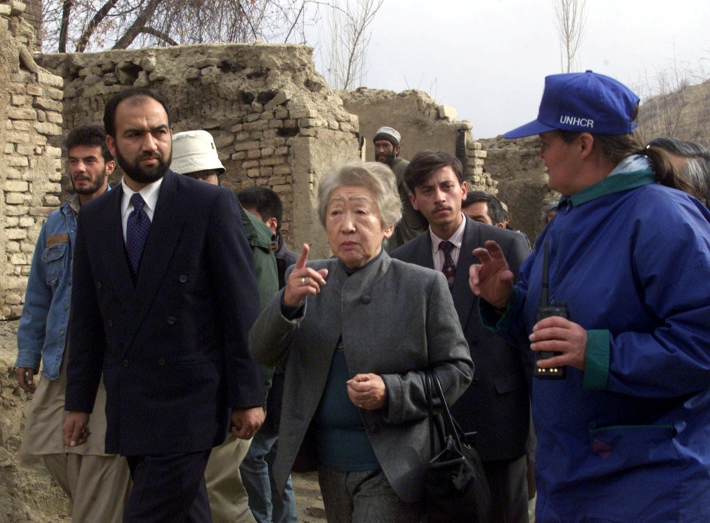 United Nations High Commissioner for Refugees Sadako Ogata gestures during a news conference in Geneva Nov. 20, 1998. - Reuters