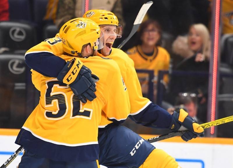 Nashville Predators center Nick Bonino (13) celebrates with defenseman Matt Irwin (52) after scoring a hat trick goal against the Chicago Blackhawks during the third period at Bridgestone Arena, Nashville, TN, USA, on Tuesday. — Reuters