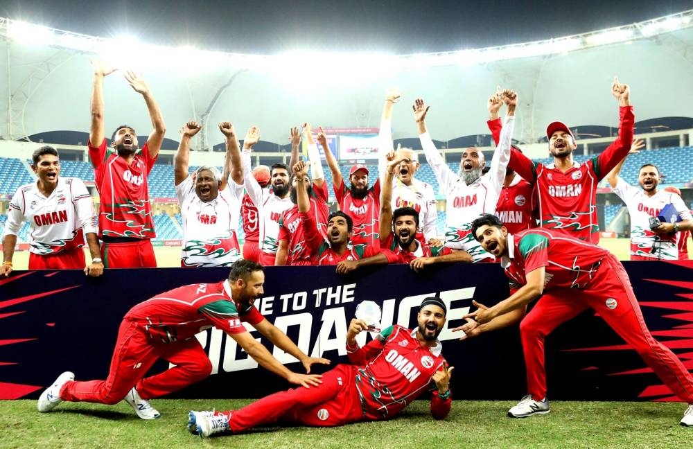 Members of Oman cricket team celebrate after qualifying for next year's Twenty20 World Cup in Australia. — Courtesy photo