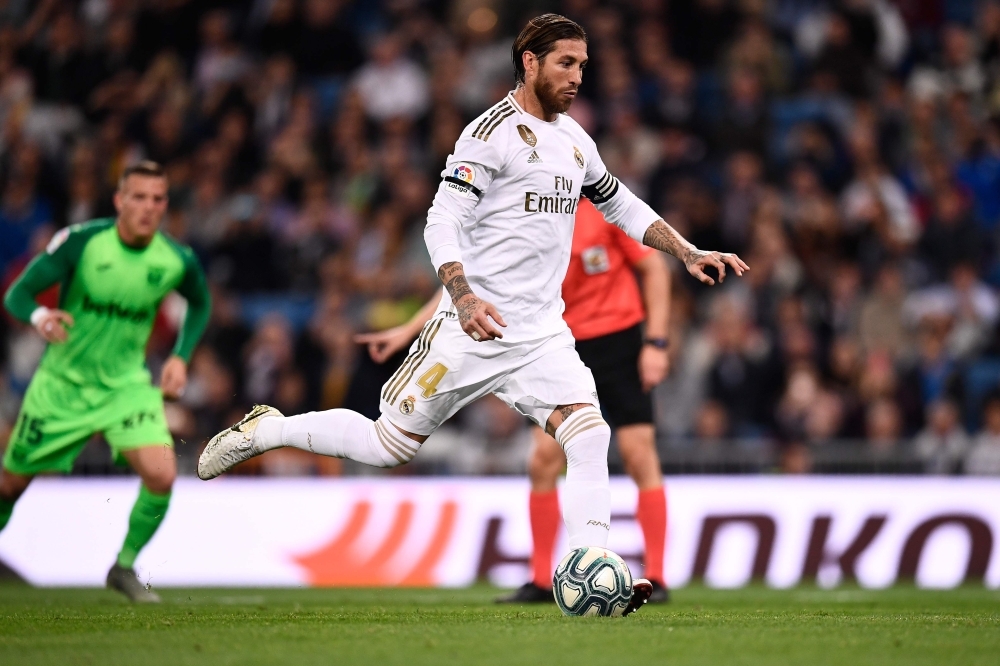 Real Madrid's Spanish defender Sergio Ramos kicks a penalty and scores during the Spanish league football match between Real Madrid CF and Club Deportivo Leganes SAD at the Santiago Bernabeu stadium in Madrid on Wednesday. — AFP