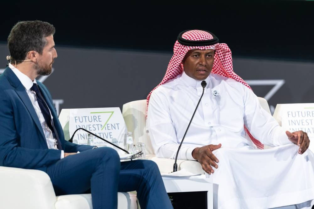 (L-R) Moderator Robbie Greenfield, Majed Al-Sorour, CEO of the Saudi Golf Federation at the FII forum in Riyadh.