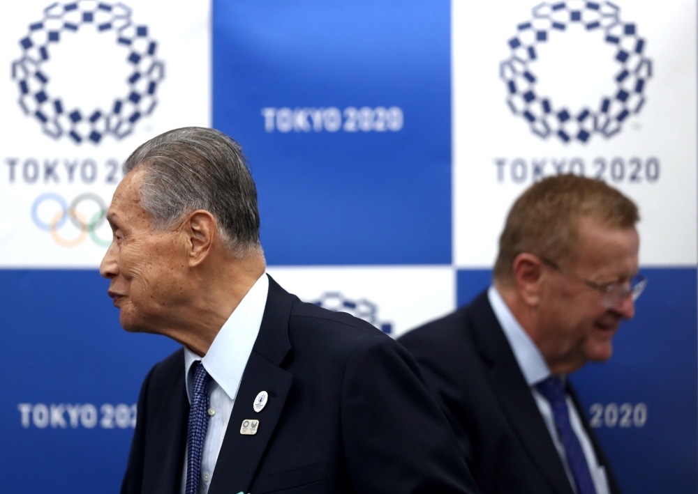 Tokyo Governor Yuriko Koike speaks during a regular press conference following a Tokyo 2020 four-party meeting with representatives from the IOC, the Tokyo2020 organizing committee, and the governments of Japan and metropolitan Tokyo, at her office in Tokyo on Friday. — AFP