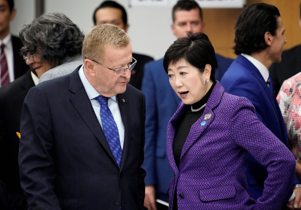 Tokyo Governor Yuriko Koike speaks during a regular press conference following a Tokyo 2020 four-party meeting with representatives from the IOC, the Tokyo2020 organizing committee, and the governments of Japan and metropolitan Tokyo, at her office in Tokyo on Friday. — AFP