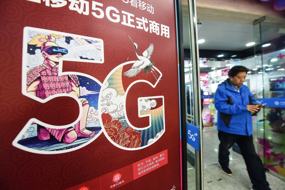 A 5G logo is seen outside a store in Hangzhou in China's eastern Zhejiang province on Thursday. — AFP