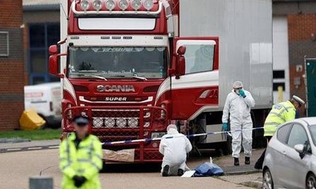 Police are seen at the scene where 39 dead bodies were discovered in a truck container, in Grays, Essex, U.K, October 23, 2019. -Reuters
