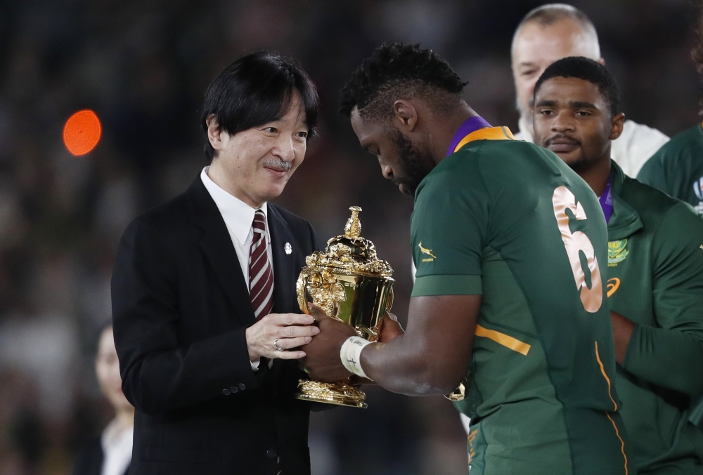 South Africa's Siya Kolisi is presented the Webb Ellis trophy by Japan's Crown Prince Akishino after winning the Rugby World Cup final at International Stadium Yokohama, Yokohama, Japan, on Saturday. — Reuters
