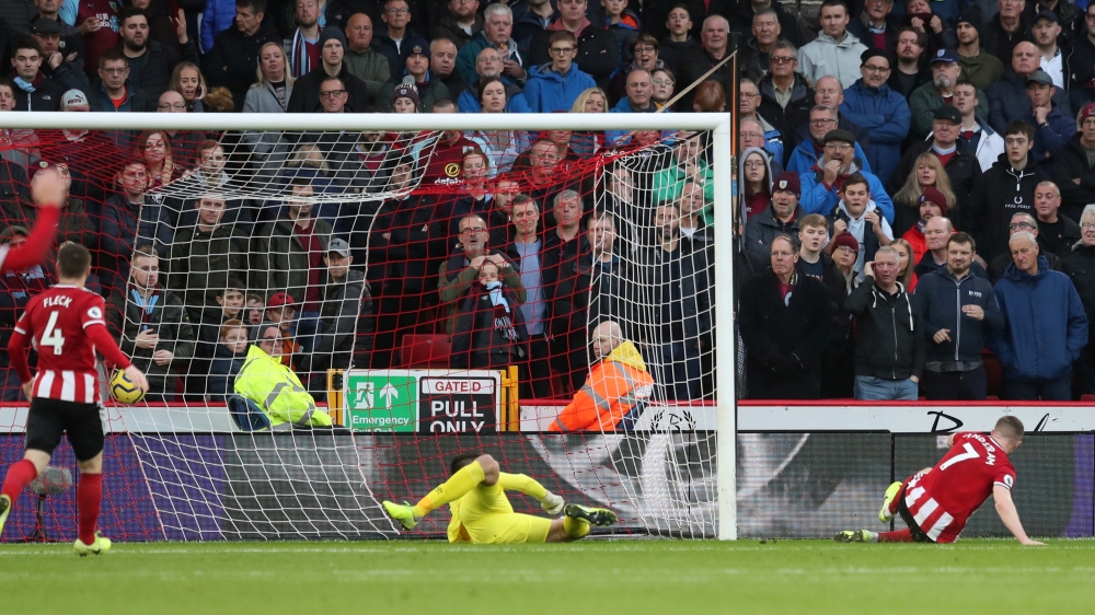 Sheffield United's John Lundstram scores their second goal against Burnley at Bramall Lane, Sheffield, Britain, on Saturday. — Reuters
