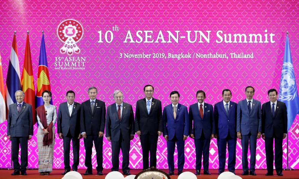 United Nations Secretary-General Antonio Guterres poses with ASEAN leaders during a summit, in Bangkok, Thailand on Sunday. -Reuters